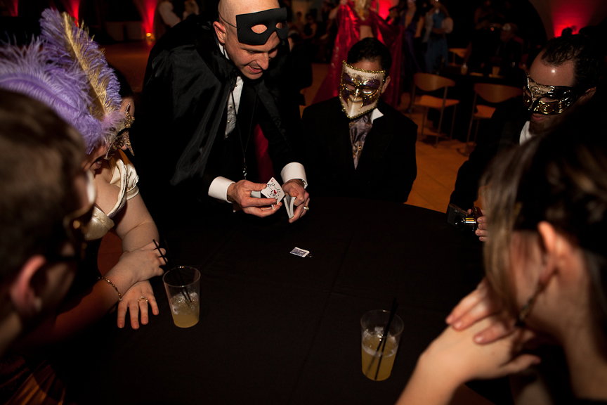 Dude has a mask and a cape. Partygoers are entranced at the 2011 Venice Is Sinking ball at Seattle Design Center. Photo: Lucas Anderson.