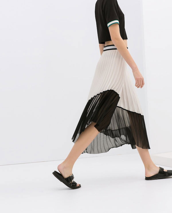 The collection's light asymmetric skirt would easily transition from winter tights to spring sandals ($79.90).Image via Zara