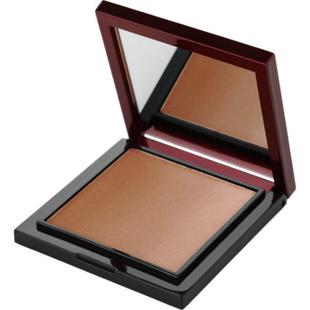 'My favorite summer product for both my clients and myself is the Kevyn Aucoin Celestial Bronzing Veil in Tropical Days ($48, Barneys New York), a silky powder bronzer that instantly transforms pale, lifeless skin to a believable warm shade with a radiant finish. Gorgeous crystal pigments of gold,silver, and bronze blend together for that perfect (and safe!) beach-worthy glow.'

Image via Kevyn Aucoin