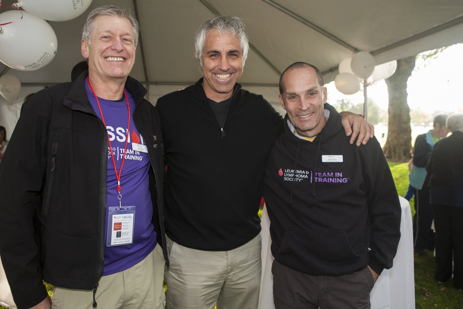 Board trustees Rod Smith and Kevin Costanza with board president Brent Evans