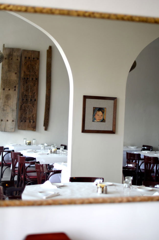 Inside the restaurant, handmade metal lamps sent from Egypt by Gargour’s family dangle from the high ceiling and a gilded portrait of his son hangs on the wall.