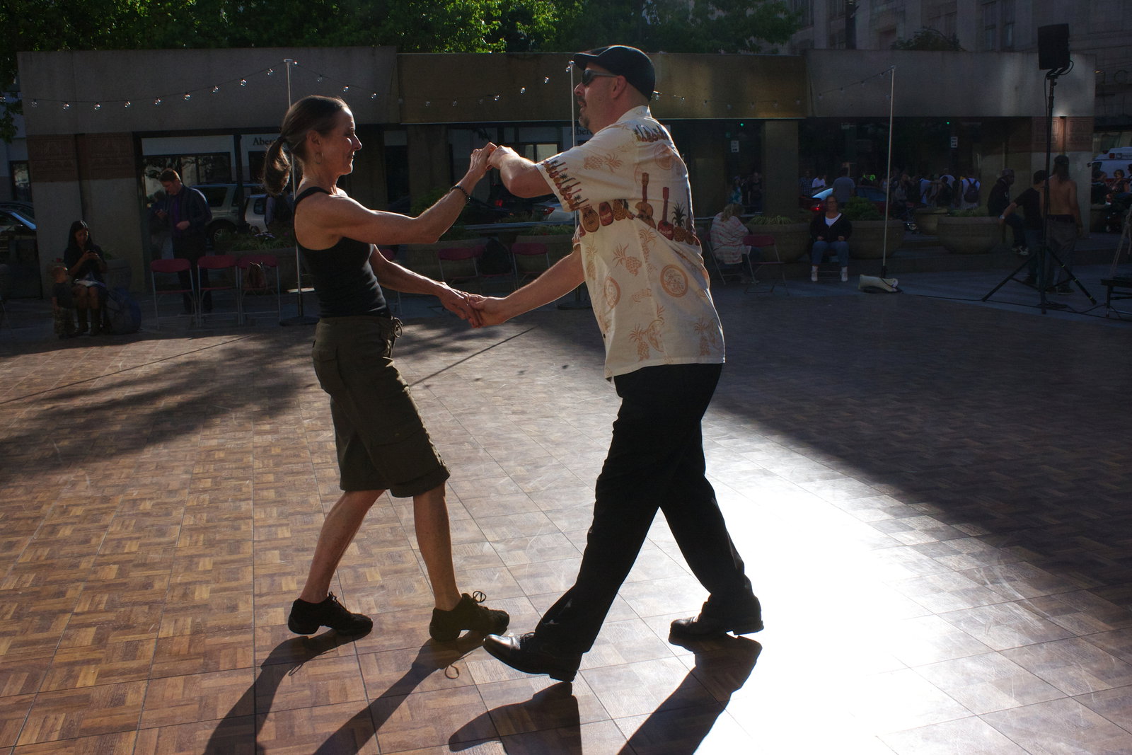 Janetmarie Wolfe and Fred Kleindenst warm up before the lesson. Kleindenst has been dancing swing for 10 years, while Wolfe just started in April. "One of the biggest things to learn at a lesson is how to just follow and stop trying to lead," said Wolfe.
