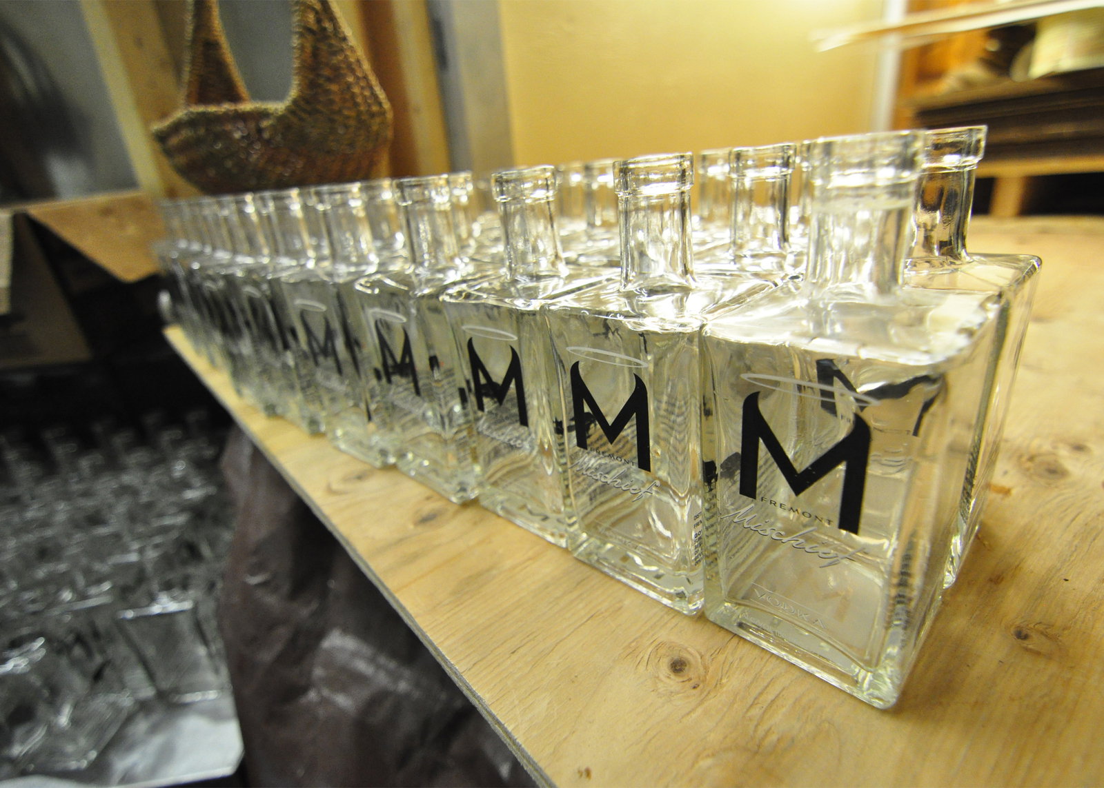 Empty bottles waiting to be filled. Sherlock explains that the M in their logo makes both devil’s horns, for mischief; and a heart that represents their love for Fremont, the ways they give back to the community, and that their spirits are all heart (did you read the previous slide?).