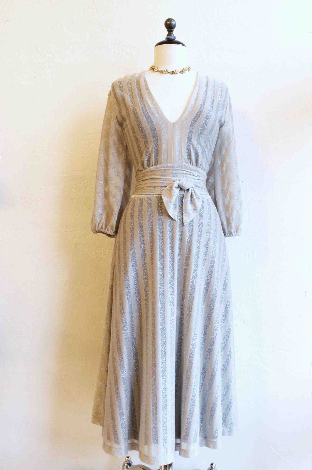 What you won’t find at Velouria is the typical slinky party dress. What you will find its twin sister: the refined free spirit with a taste for modern charm. Example B: dress by Mae (LA designer) for $75 and vintage reworked necklace by Violet Magpie (Seattle) for $65.