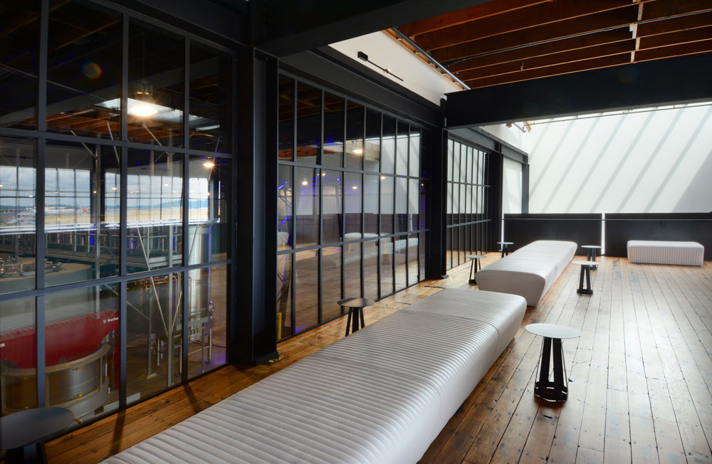 Upstairs: more views of the production area and an event space. Photo via Charles Smith Wines.